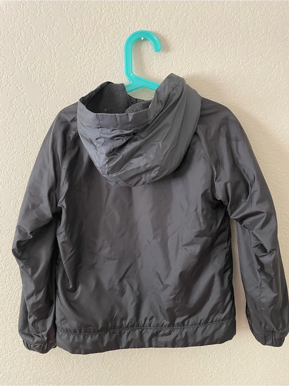 Nike Kids Black Raincoat with White Logo
